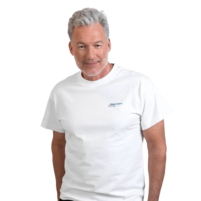 man wearing white tshirt with atlas copco group logo