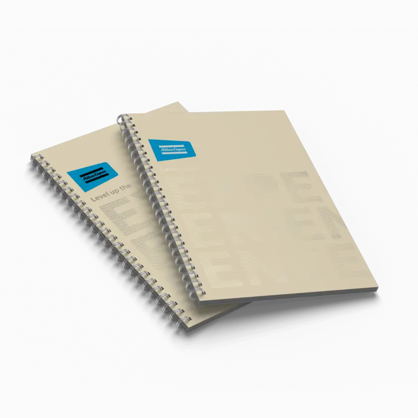 close up of logo and notebook spiral