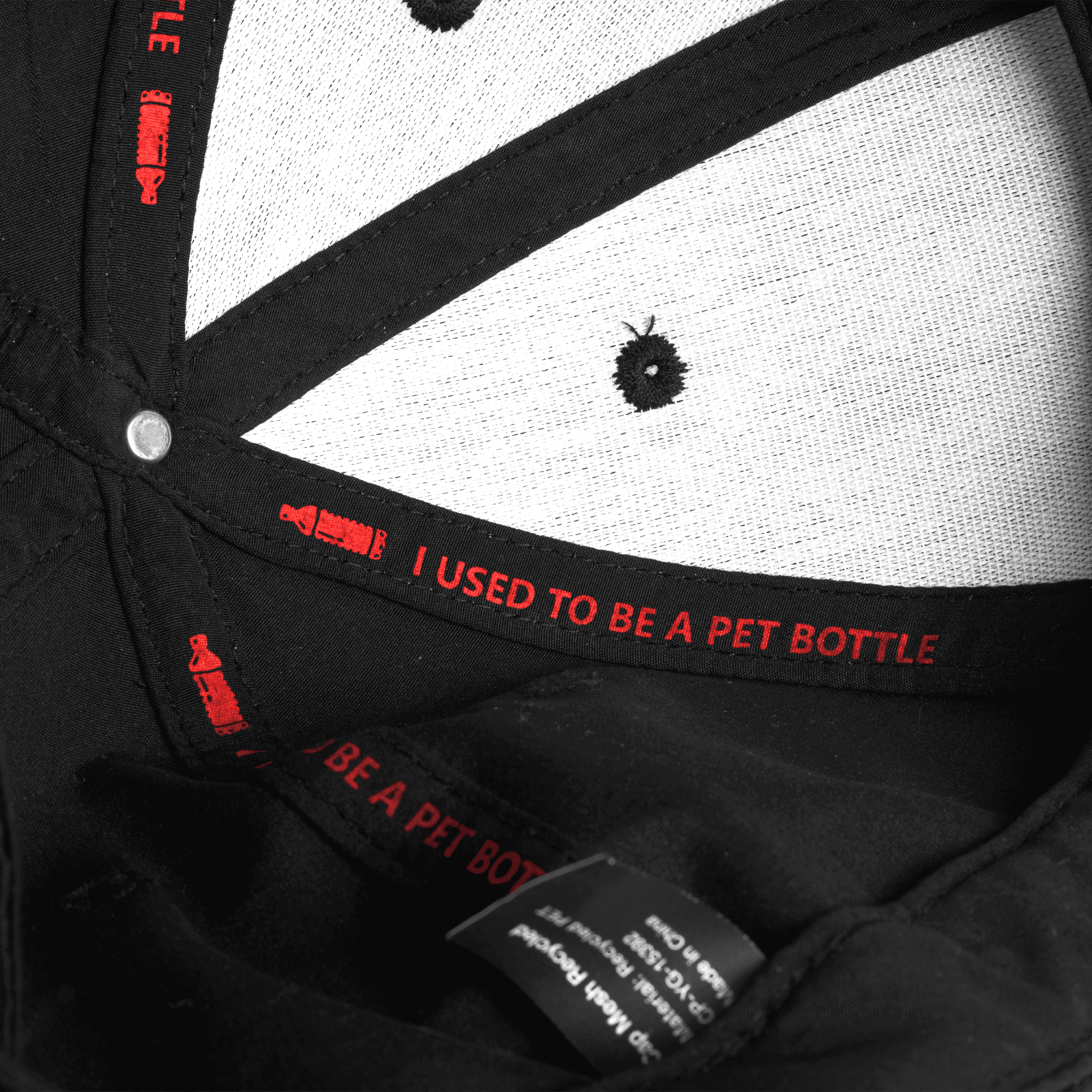 black cap from inside with recycled message