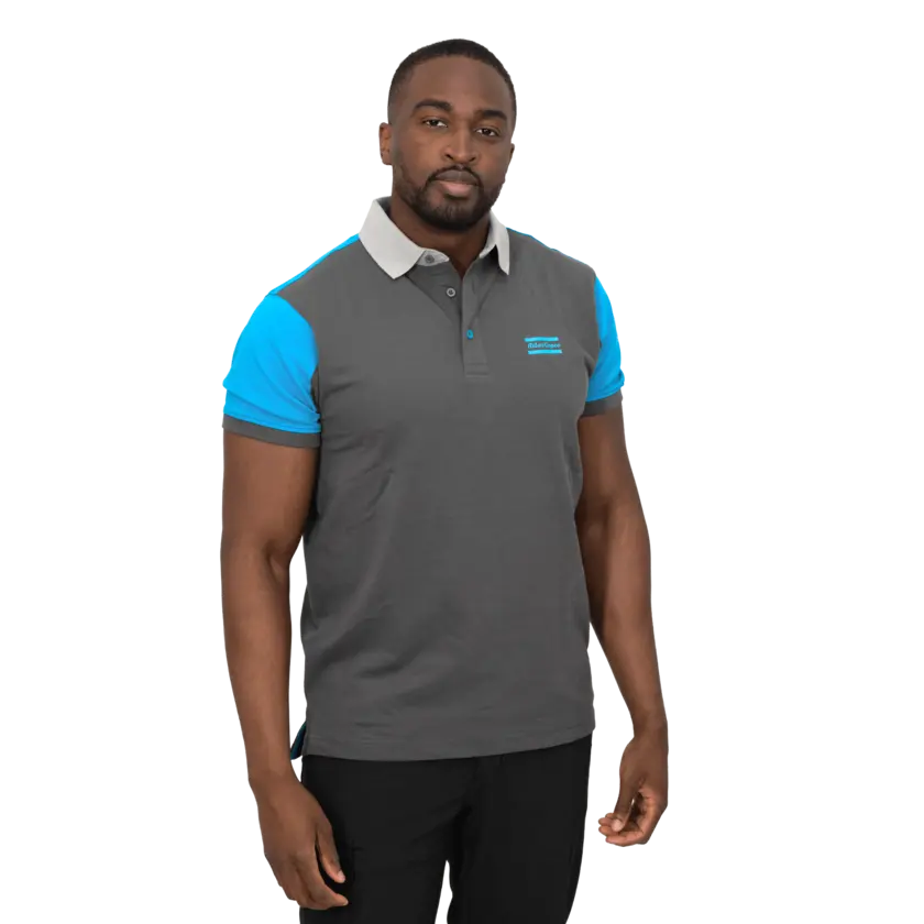 grey polo with blue shoulders and atlas copco logo