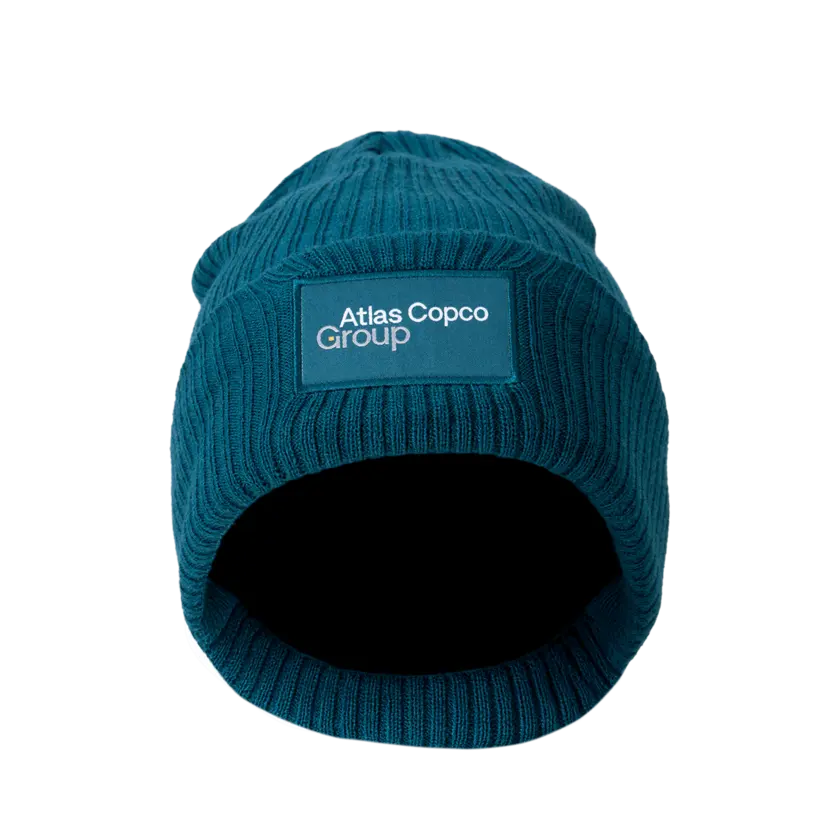 teal winter hat with atlas copco group logo